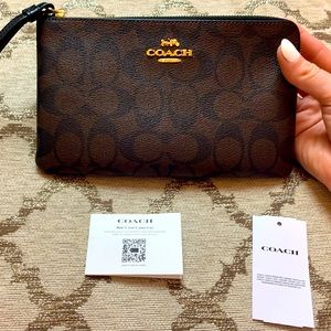 Coach large corner zip wristlet in signature canvas